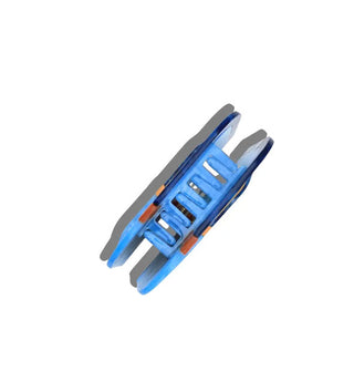 Sardin tin claw clip turned on end to show its teeth