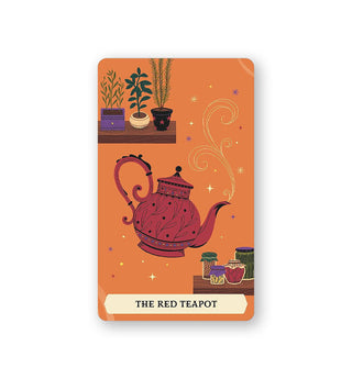 The Red Teapot card from The Secret Oracle of the Green Witch features illustration of a floating red teapot emitting steam against an orange backdrop where various plants and jars are stored on wooden shelves
