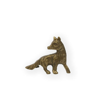 Brass fox figurine with textural etched details
