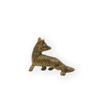 Brass fox figurine with textural etched details