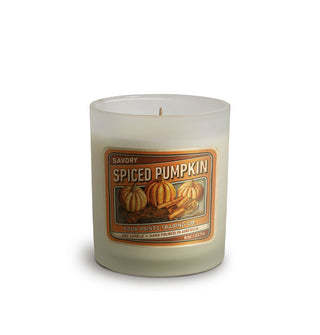 Frosted glass Savory Spiced Pumpkin candle jar with orange-dominant illustrated label