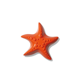 Orange starfish figurine with knobby details