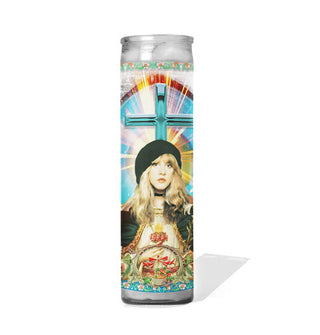 Tall glass prayer candle with colorful label depicting Stevie Nicks as a saint