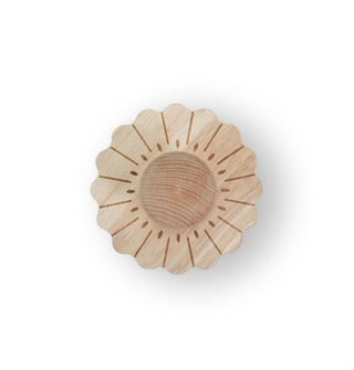 Top view of a round wooden brush with knob handle is shaped and stained to look like a petaled flower