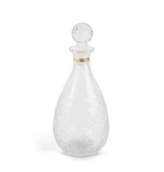 Teardrop-shaped faceted glass decanter with gold band around the neck and a rounded stopper