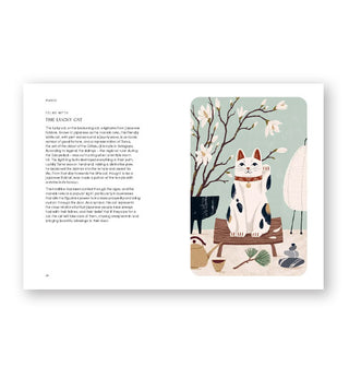 Page spread from The Cat Year features a section titled, "The Lucky Cat" with corresponding illustration