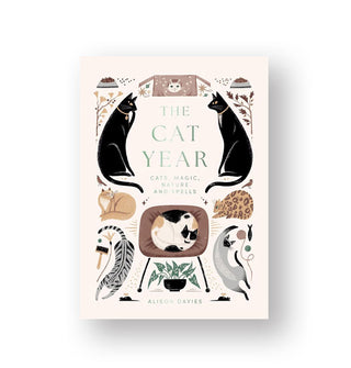 Cover of The Cat Year: Cats, Magic, Nature and Spells features whimsical cat illustrations accented by everyday objects typically associated with cats