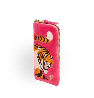 Rectangular magenta eyeglass case with gold zipper features embroidered design of a fierce-looking tiger with tail curled above its head