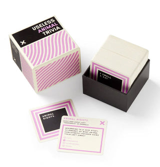 Opened Useless Animal Trivia game box with cards visible and two removed