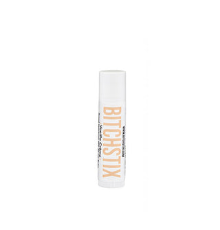 White tube of Bitchstix lip balm with large pale peach lettering