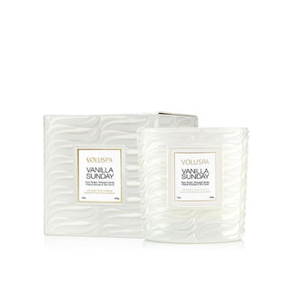 Milky embossed glass Vanilla Sunday Voluspa candle jar alongside its matching gift box