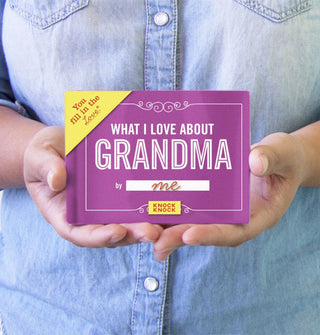 Model holds a copy of What I Love About Grandma