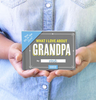 Model holds a copy of What I Love About Grandpa