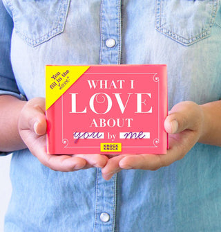 Model holds a copy of What I Love About You