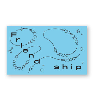 Blue page spread from What Taylor Says features the word, "Friendship" accented with strings of circles and stars