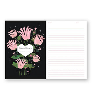 Journal interior features a black inside cover with pink flowers and bookplate alongside a white, lined page