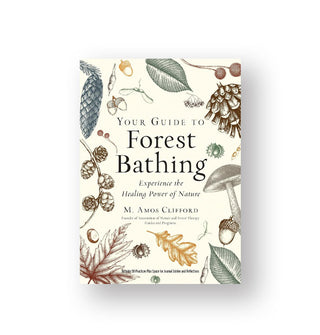 Cover of Your Guide to Forest Bathing by M. Amos Clifford features a border of illustrated leaves, pine cones, mushrooms, and other flora